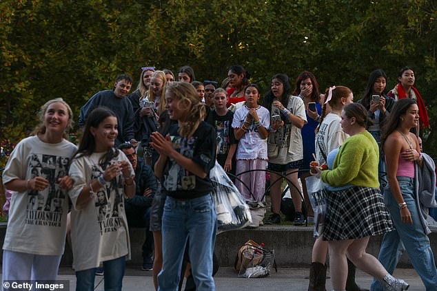 However, on the night, fans were said to have been stamping their feet in time to the music outside the MCG and dancing on the grass as Swiftie mania swept Australia