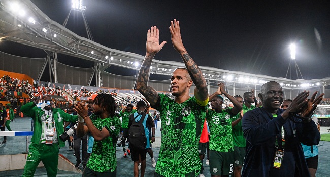 Nigeria's defender #5 William Troost-Ekong (C) celebrates after the victory at the end of the Africa Cup of Nations (CAN) 2024 quarter-final football match between Nigeria and Angola at the Felix Houphouet-Boigny Stadium in Abidjan on February 2, 2024. 
